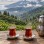 AI-generated illustration of two Turkish tea glasses and a stacked teapot overlooking green Black Sea tea hills.